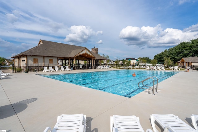 view of pool featuring a patio