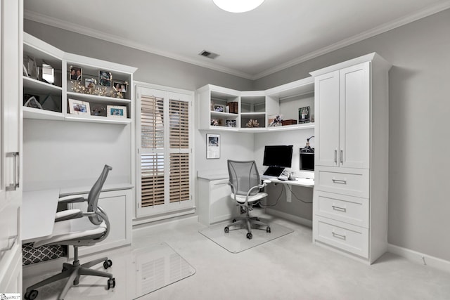 carpeted office featuring ornamental molding