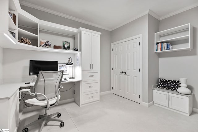 office with crown molding and light carpet