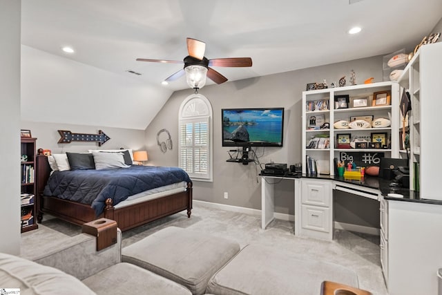 carpeted bedroom featuring ceiling fan and lofted ceiling