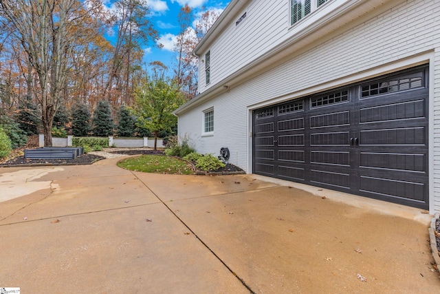 exterior space with a garage