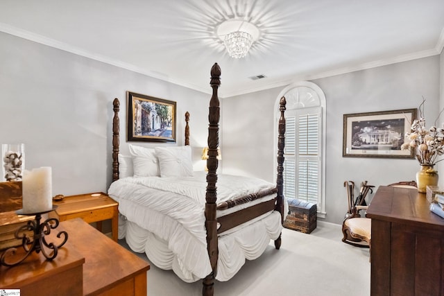 carpeted bedroom featuring a notable chandelier and ornamental molding