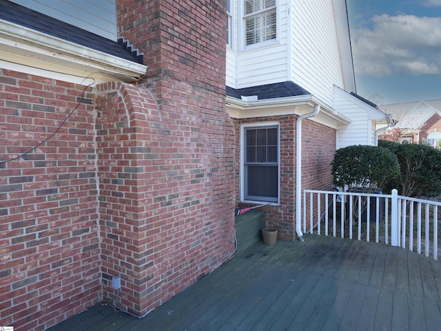 doorway to property featuring a deck