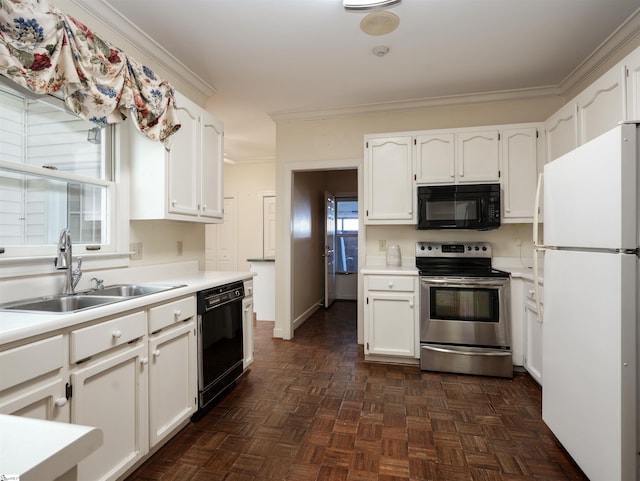 kitchen featuring crown molding, white cabinetry, sink, and black appliances