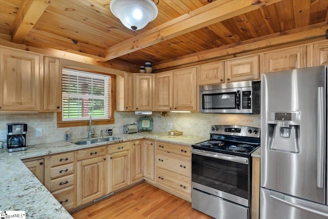 kitchen featuring light brown cabinets, sink, light hardwood / wood-style floors, light stone counters, and stainless steel appliances