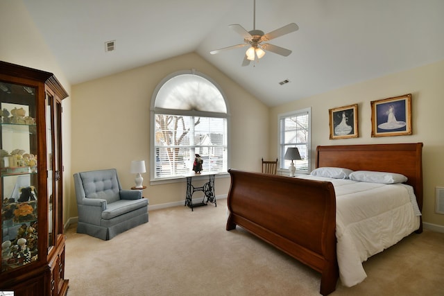 carpeted bedroom featuring vaulted ceiling and ceiling fan