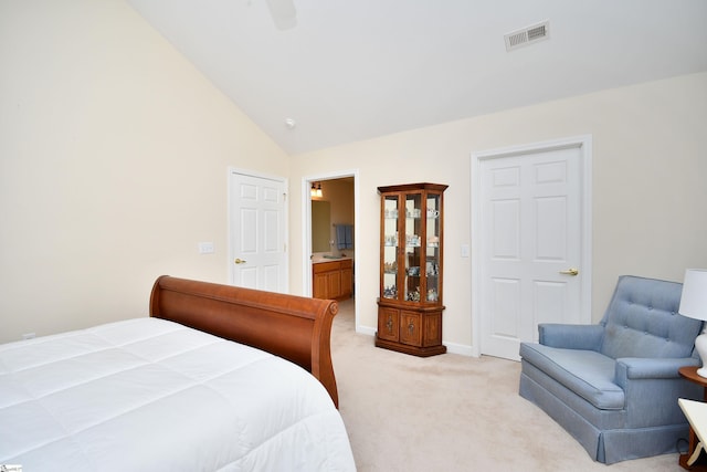 bedroom with connected bathroom, ceiling fan, high vaulted ceiling, and light colored carpet