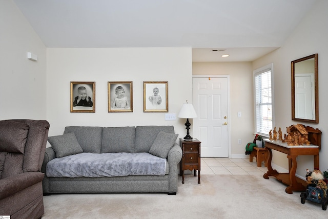 living room featuring light carpet