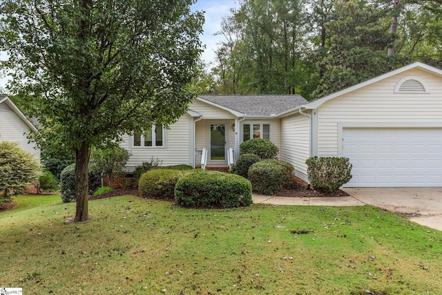 single story home with a front yard and a garage