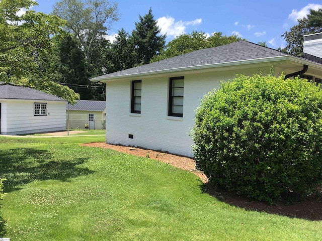 view of property exterior featuring a yard