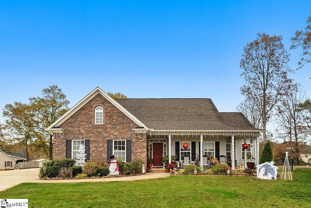 view of front of home with a front lawn and covered porch