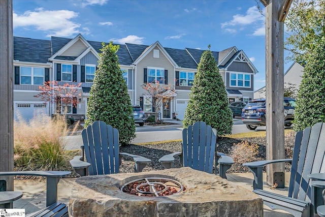 view of patio / terrace featuring a fire pit