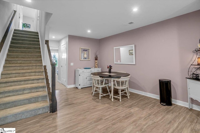 dining room with light hardwood / wood-style flooring