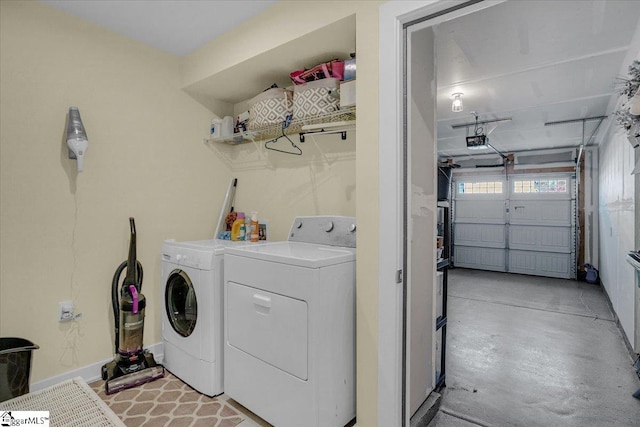 washroom featuring washing machine and clothes dryer