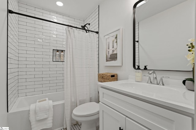 full bathroom with shower / bath combo, vanity, and toilet