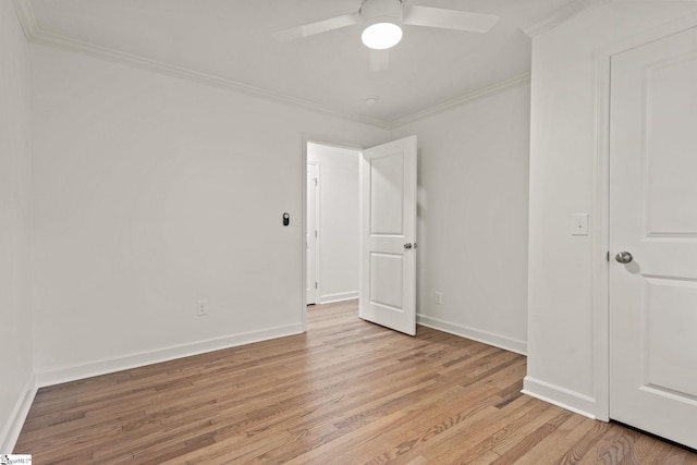 unfurnished bedroom with light hardwood / wood-style flooring, ceiling fan, and crown molding