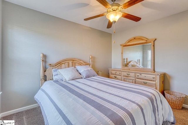 bedroom featuring ceiling fan and light colored carpet