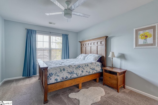 bedroom with ceiling fan and carpet