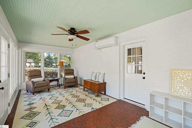 sunroom / solarium with a wall mounted AC and ceiling fan