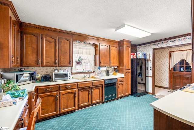 kitchen with light carpet, a textured ceiling, sink, and black appliances