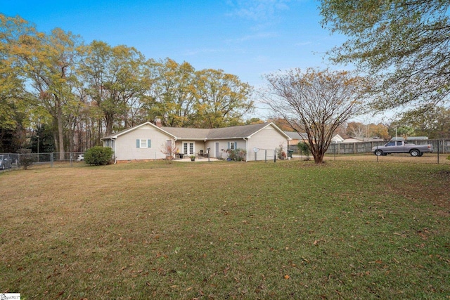 single story home featuring a front yard