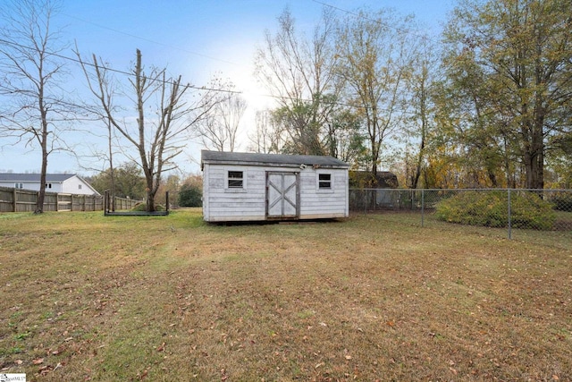 view of outdoor structure with a yard