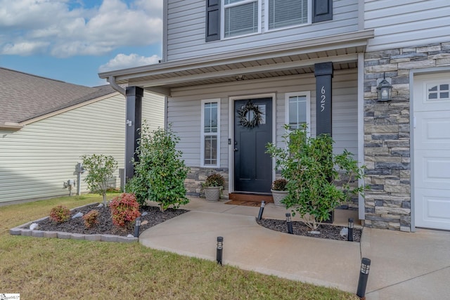 property entrance featuring covered porch