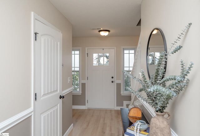 entrance foyer with light wood-type flooring