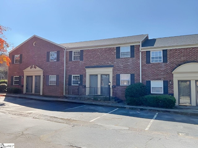 2530 E N St Unit 11C, Greenville, SC 29615 - townhome / multi-family property featuring uncovered parking and brick siding