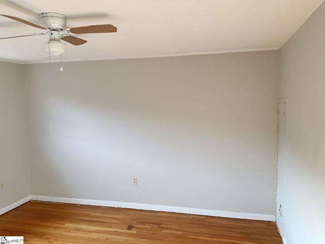 2530 E N St Unit 11C, Greenville, SC 29615 - unfurnished room with wood finished floors, baseboards, ornamental molding, and a ceiling fan