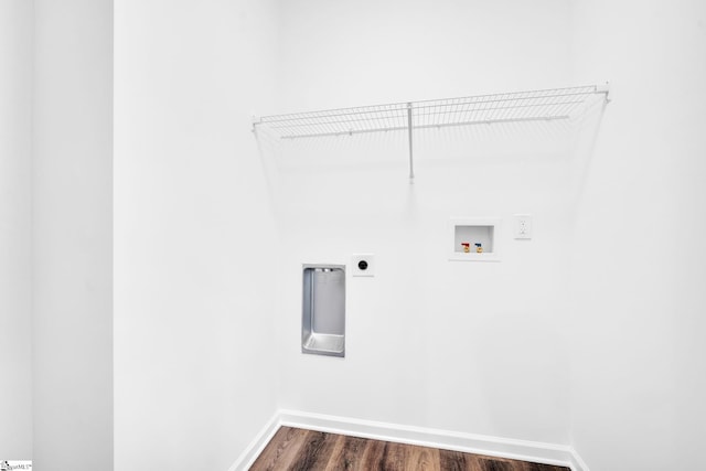 washroom featuring hookup for an electric dryer, hookup for a washing machine, and dark hardwood / wood-style floors