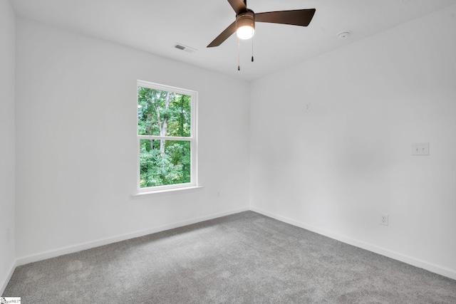 carpeted empty room with ceiling fan