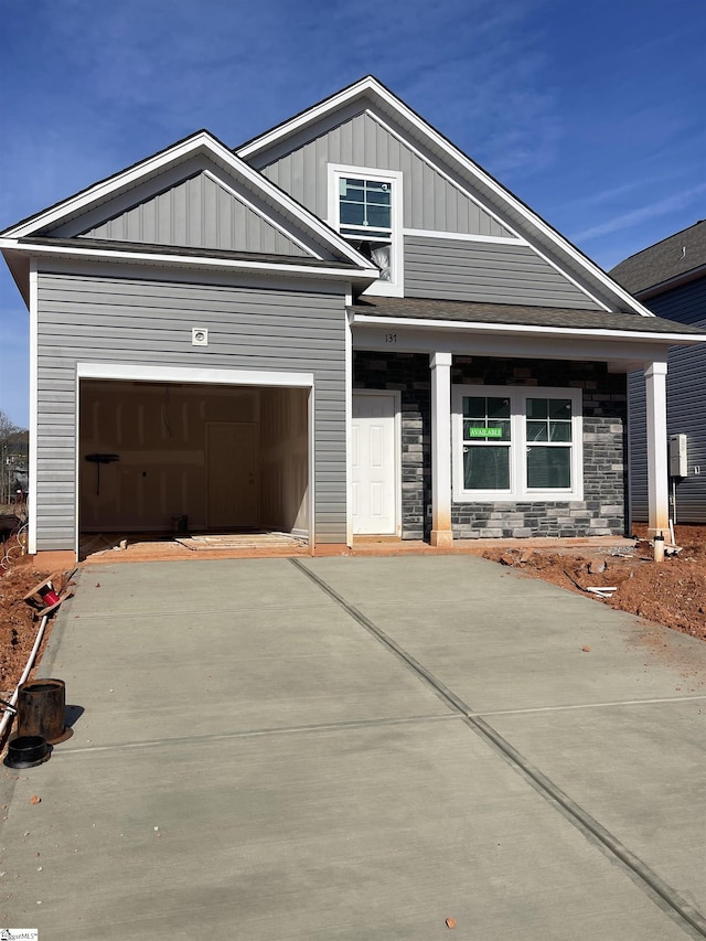 craftsman inspired home with a garage