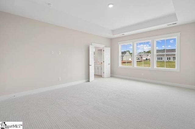 115 Pipet Rd Unit 14, Piedmont, SC 29673 - spare room featuring light carpet, a raised ceiling, a smoke detector, and recessed lighting