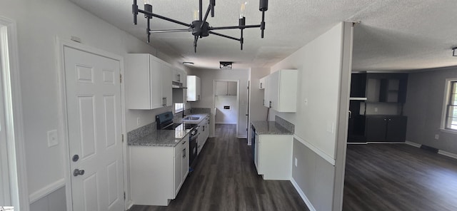 kitchen with white cabinets, plenty of natural light, electric range, and dark wood-type flooring