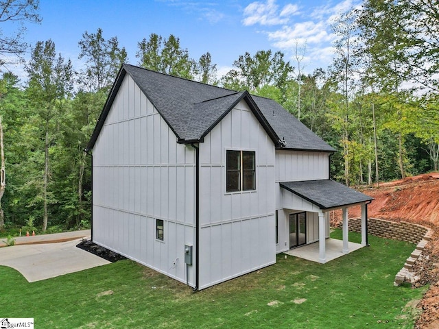 view of outbuilding with a yard