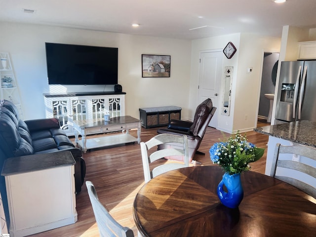 living room with light hardwood / wood-style floors