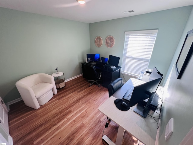 office featuring hardwood / wood-style floors