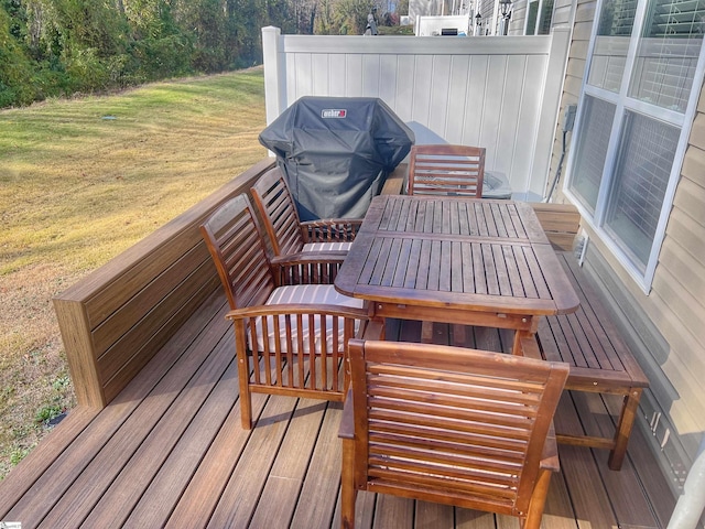 deck featuring a grill