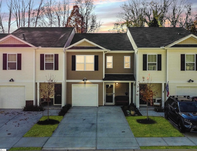 view of front of property with a garage