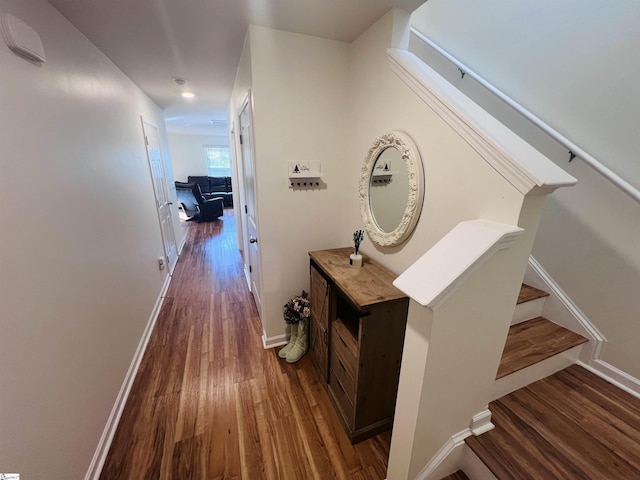 corridor with dark wood-type flooring