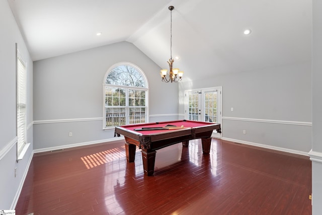 game room with french doors, an inviting chandelier, billiards, dark hardwood / wood-style floors, and lofted ceiling