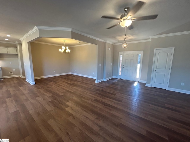 entrance foyer with dark wood-style floors, baseboards, ornamental molding, and ceiling fan with notable chandelier