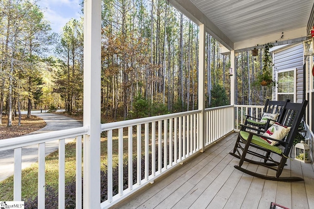 wooden deck with a porch