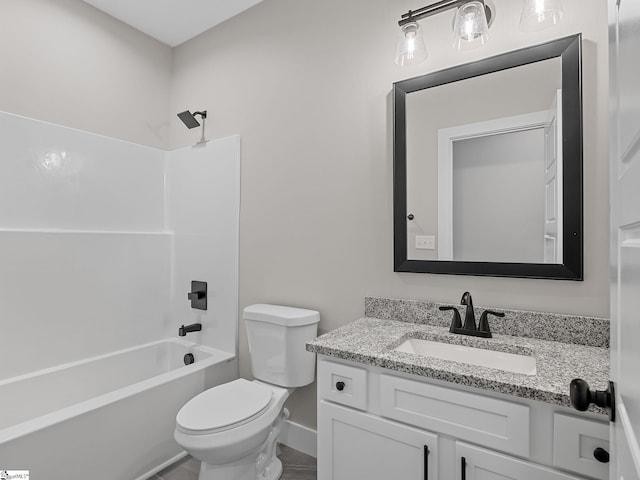 full bathroom with toilet, vanity, and washtub / shower combination