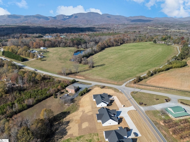 bird's eye view with a mountain view