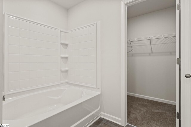 421 Haddon Trl Lot 58, Woodruff, SC 29388 - full bathroom featuring baseboards, washtub / shower combination, and a walk in closet