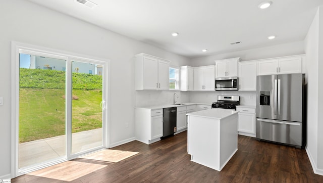 305 Lodestone Rd Lot 0267, Simpsonville, SC 29680 - kitchen with stainless steel appliances, visible vents, light countertops, white cabinetry, and dark wood-style floors