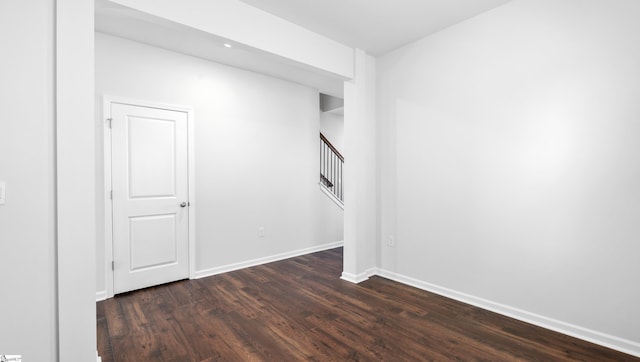 305 Lodestone Rd Lot 0267, Simpsonville, SC 29680 - empty room featuring baseboards, dark wood-type flooring, and stairs