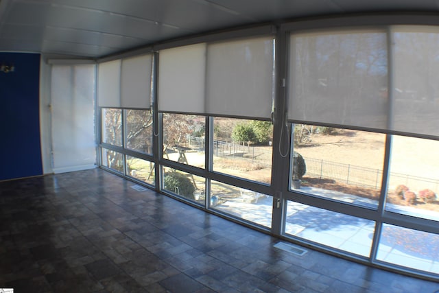 view of unfurnished sunroom